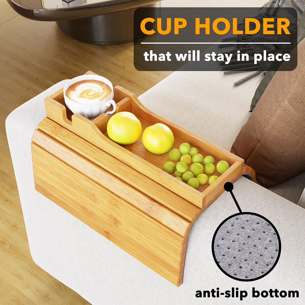 SpaceAid bamboo couch cup holder folded for compact storage beside sofa.