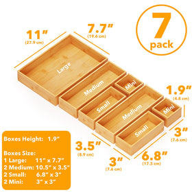 SpaceAid bamboo medium drawer organizer helps organize silverware and kitchen tools with clear separation.