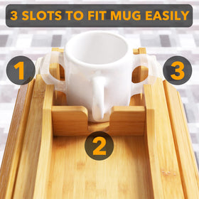 SpaceAid cup holder with drinks and snacks on sofa arm.