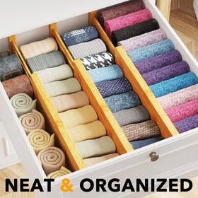 Expandable divider extending from 12.5 to 17 inches to fit your drawer.
