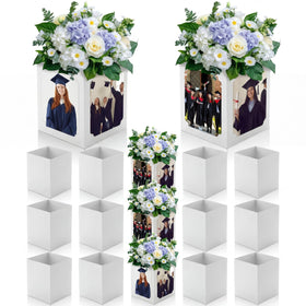 Spiareal graduation box centerpiece displays four-sided photo moments on a table.