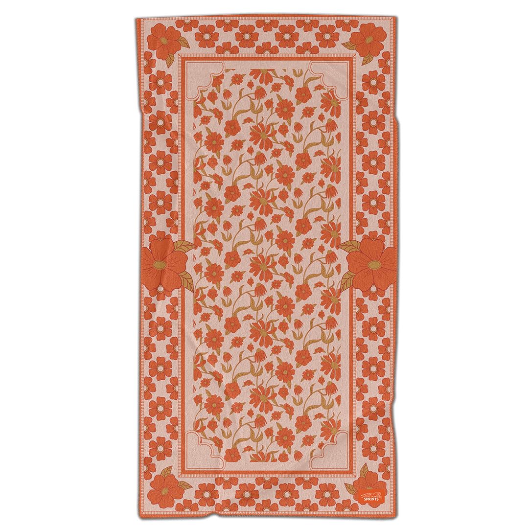 Sprints towel with pocket top designed to slip over a headrest.