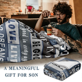 Spwasplo son blanket on sofa highlights practical warmth for daily lounging.
