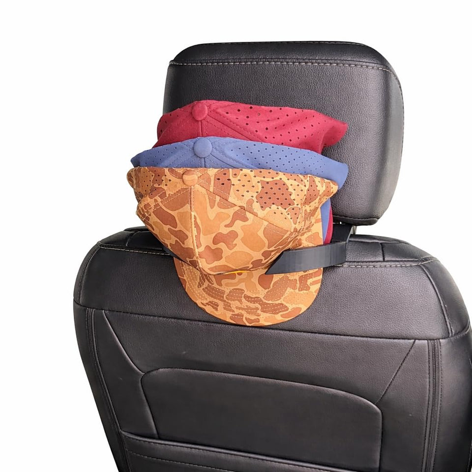 SPWM CabCap headrest mount keeps hats neatly behind the seat for quick access.