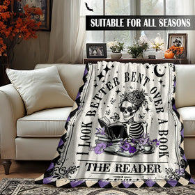 Sruemiul gothic reading blanket draped to add spooky ambiance.
