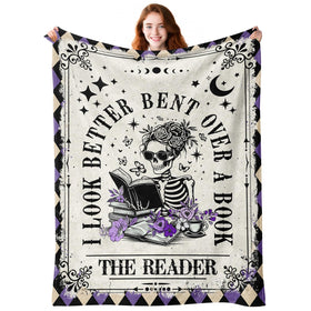 Sruemiul skeleton reading blanket close-up for a cozy gothic reading nook.