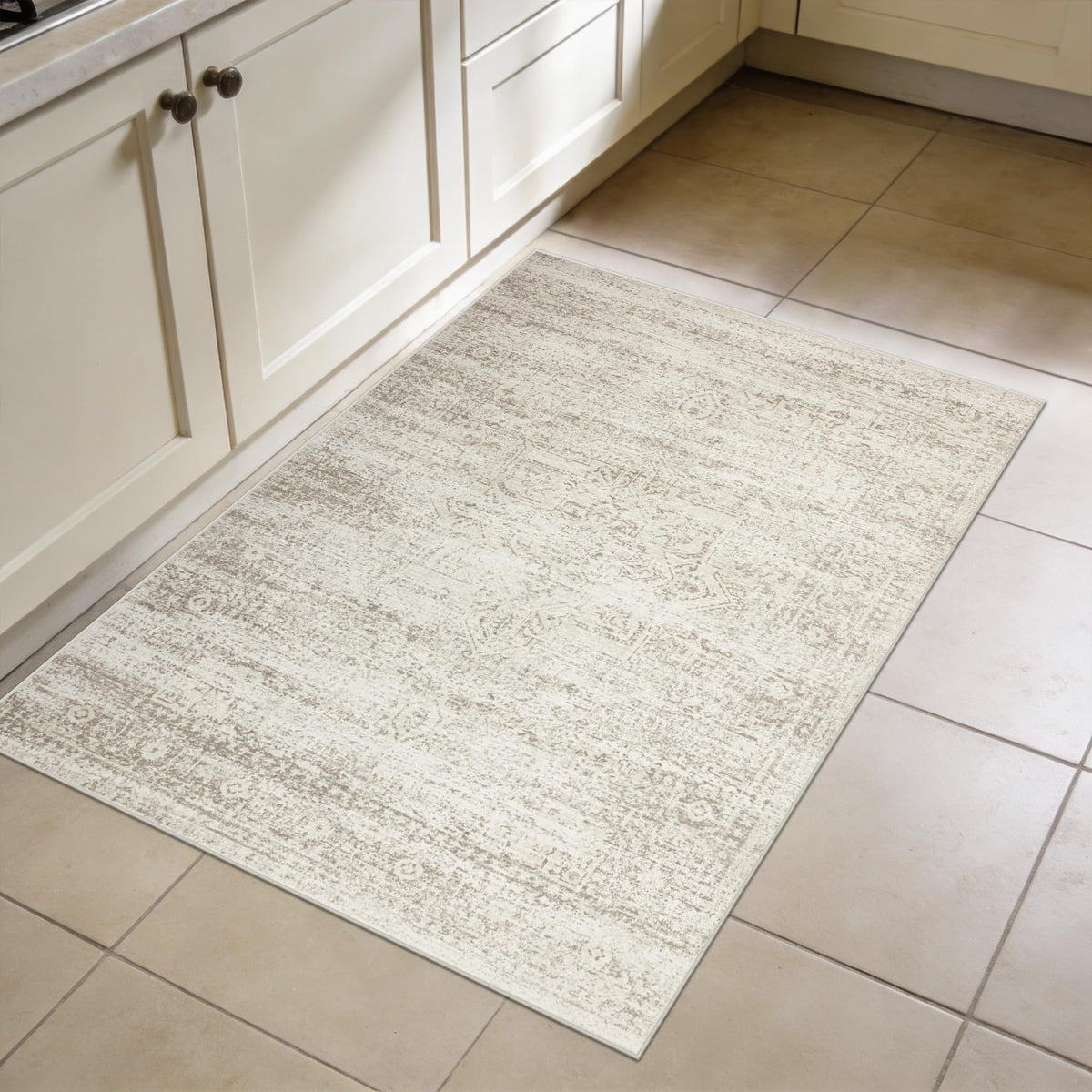 Srugn 2x3 cream entryway rug provides soft underfoot welcome.