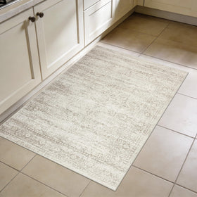 Srugn 2x3 cream entryway rug provides soft underfoot welcome.