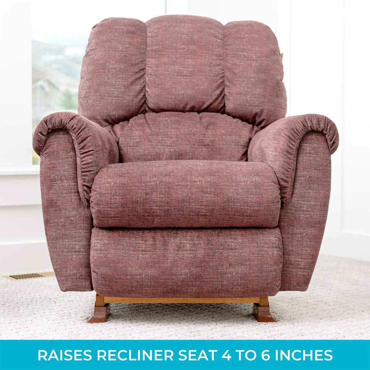 Stander Recliner Risers on wooden legs provide stable seating and stand assistance.