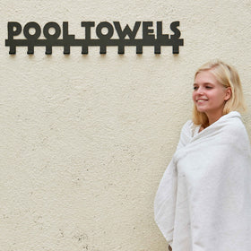 Indoor or outdoor Star Splash towel rack on wall
