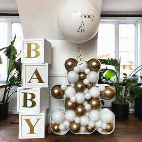 Easy-to-assemble babyshower boxes shown in quick setup.
