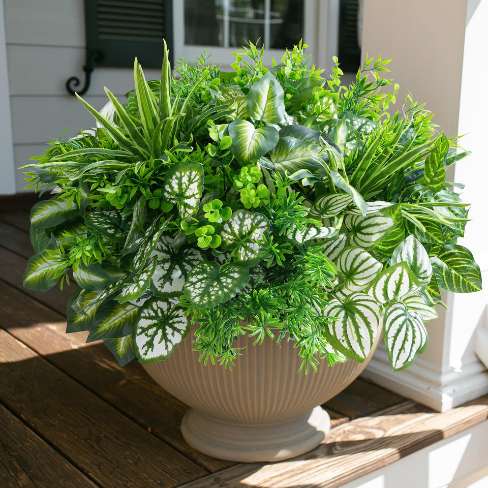 Starttag artificial greenery with lifelike leaves for outdoor display.
