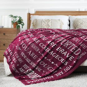 SteadStyle blanket features inspirational text close-up for motivation