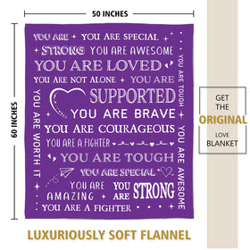 SteadStyle Get Well Blanket folded on bed for cozy relaxation.