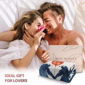 SteadStyle gift-packaged blanket presented as a thoughtful anniversary surprise.