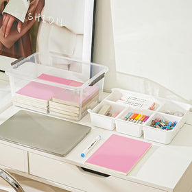 Stebopum bead, sewing, and art supplies organized in a clear container