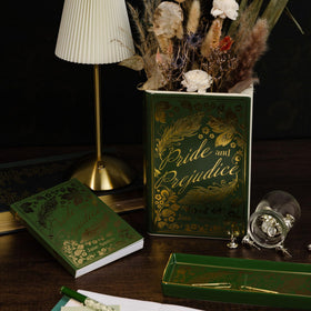 Steel Mill & Co book vase on shelf with flowers enhances room warmth