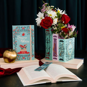 Steel Mill & Co vase supports floral arrangements with three-top and one-bottom chamber.