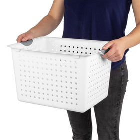 Sterilite home office storage basket keeps supplies neatly arranged.