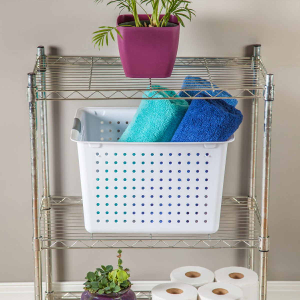 Sterilite kitchen cabinet organizer basket maximizes vertical storage space.