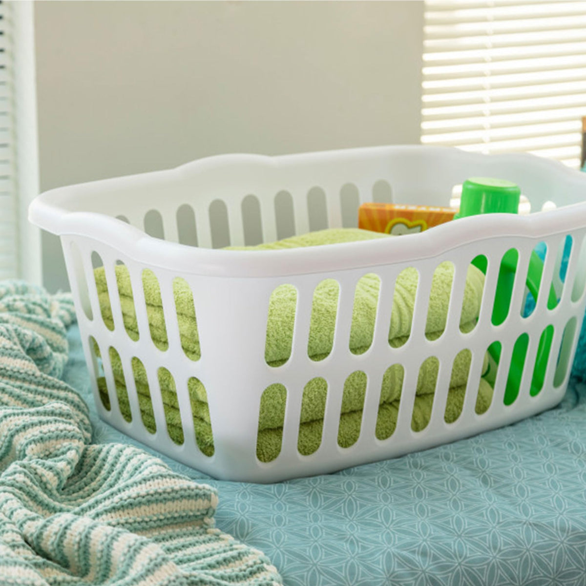 Sterilite ventilated laundry basket with holes promotes airflow.