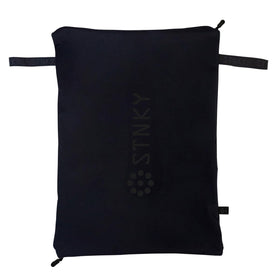 STNKY Bag Pro folded-compact shows easy storage on the go.