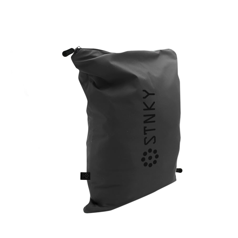 STNKY Bag Pro inside mesh bag demonstrates separate wash compartments for dirty gear.