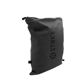STNKY Bag Pro inside mesh bag demonstrates separate wash compartments for dirty gear.