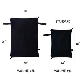 STNKY Bag Pro shown in travel setup, fitting into a carry-on or backpack.