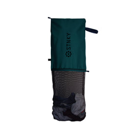 STNKY Bag Pro zip closure demonstrates secure separation of dirty and clean items for travel.