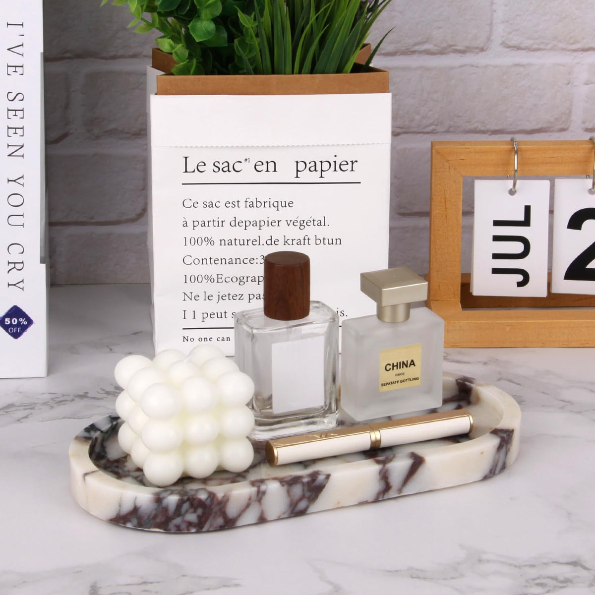 Stonemanus marble tray doubles as a candle holder