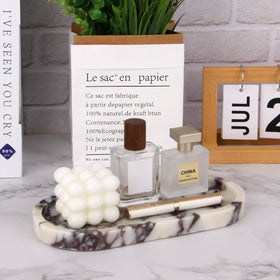 Stonemanus marble tray doubles as a candle holder