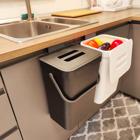 stonespace under-sink trash can front view; compact and odor-free for discreet storage.