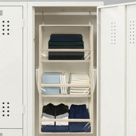 Storage Maniac mesh pockets hold small items like belts and socks for easy access.