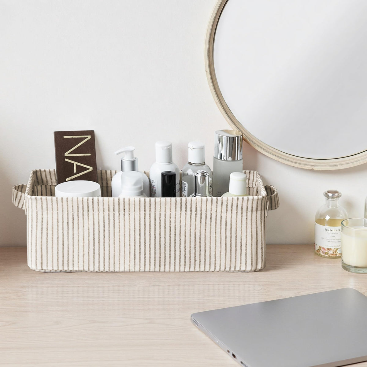 StorageWorks bin filled with toilet paper demonstrates practical bathroom storage.