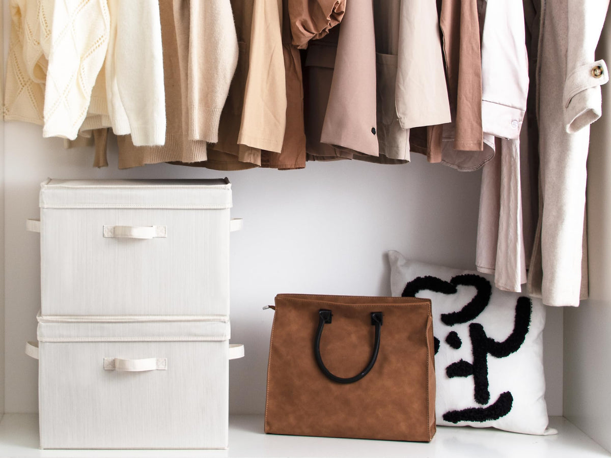 StorageWorks collapsible storage bin shown folded flat for space saving.