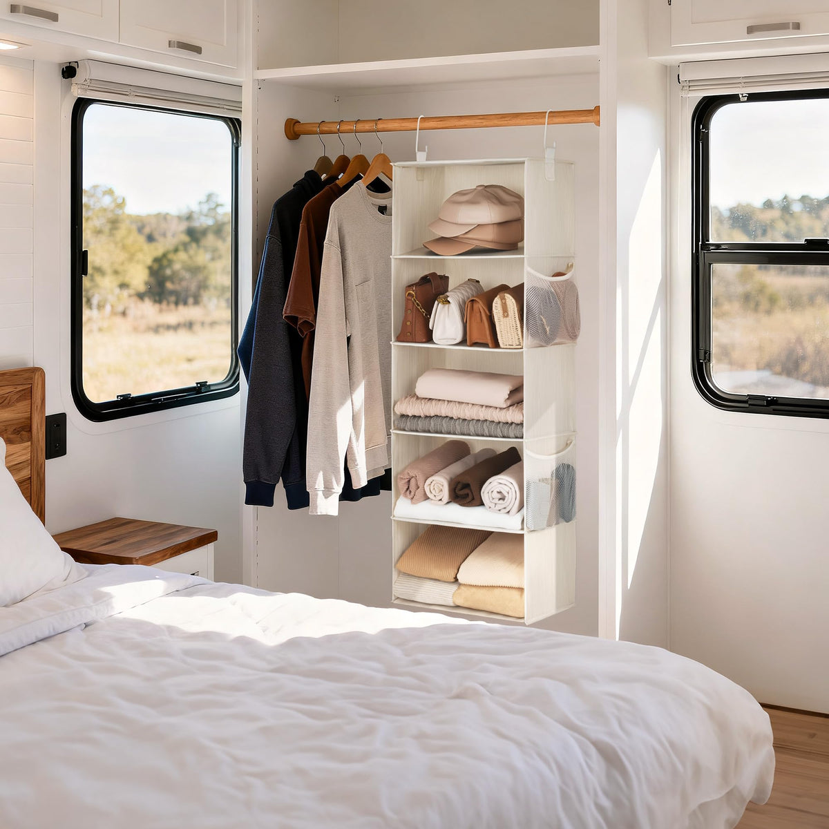 StorageWorks compact closet storage helps organize sweaters, towels, and jeans efficiently.