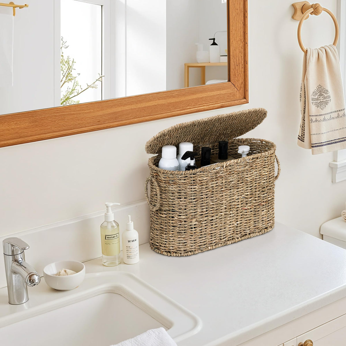 StorageWorks flip-top cover keeps moisture and dust away in busy bathrooms.