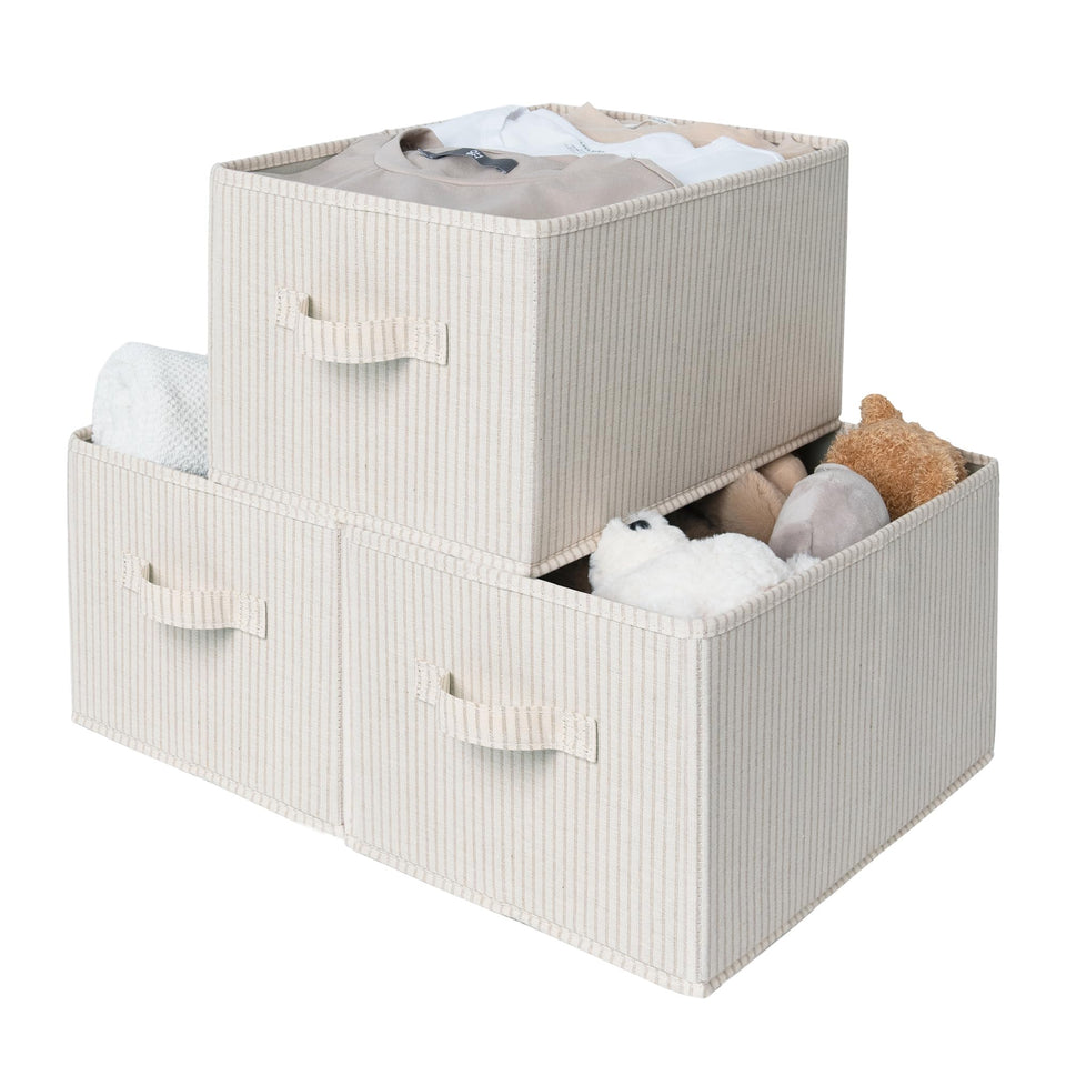 StorageWorks foldable shelf bin beige stripes on a closet shelf for organized clothing.