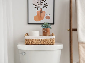 StorageWorks handwoven basket with wooden handles for secure carrying.