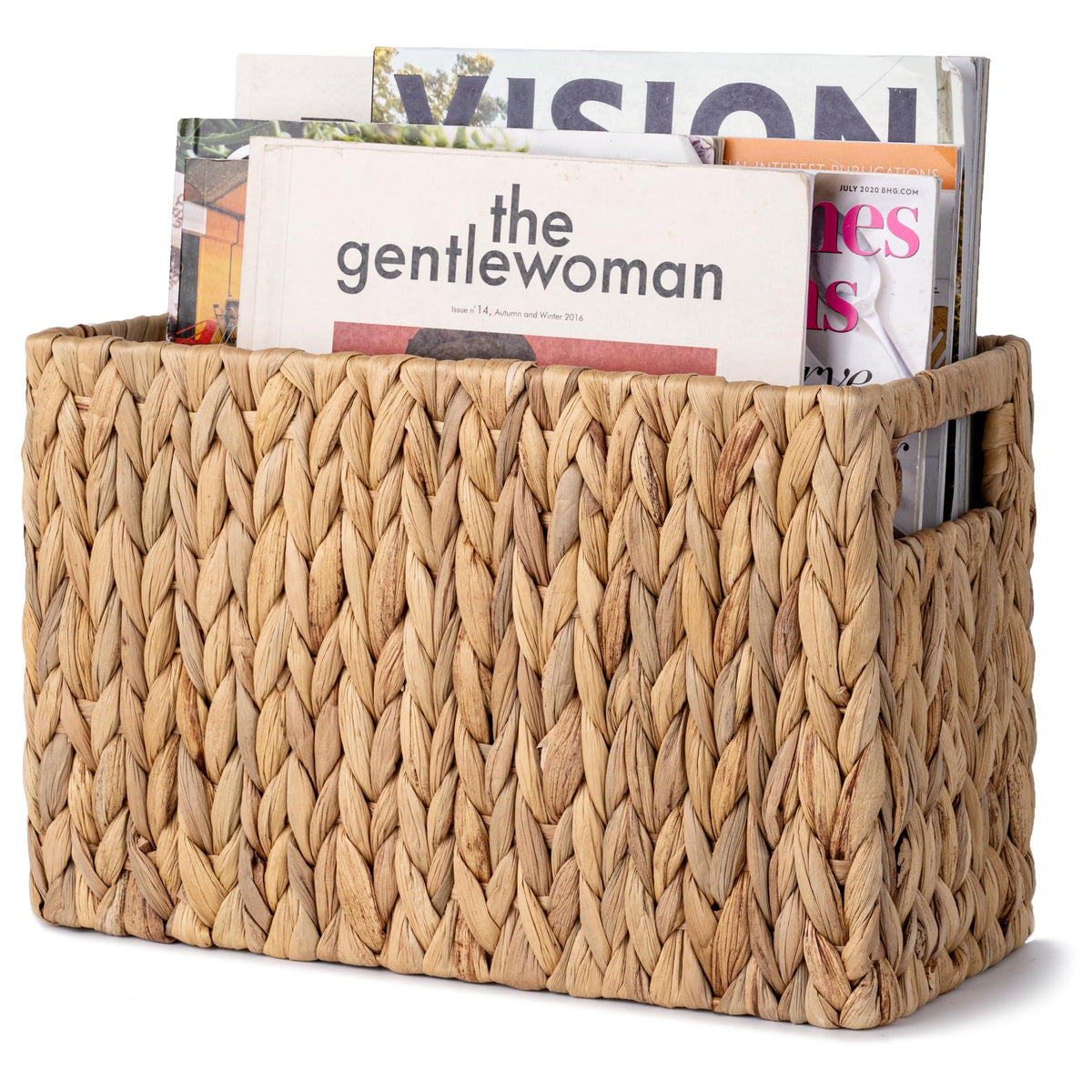 StorageWorks handwoven magazine holder on a coffee table keeps living room clutter organized.
