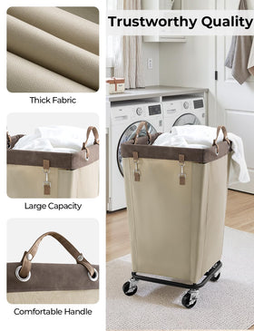 StorageWorks laundry basket with leather handle for comfortable grip.