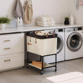 StorageWorks Laundry Cart in use in bedroom or dorm for sorting.