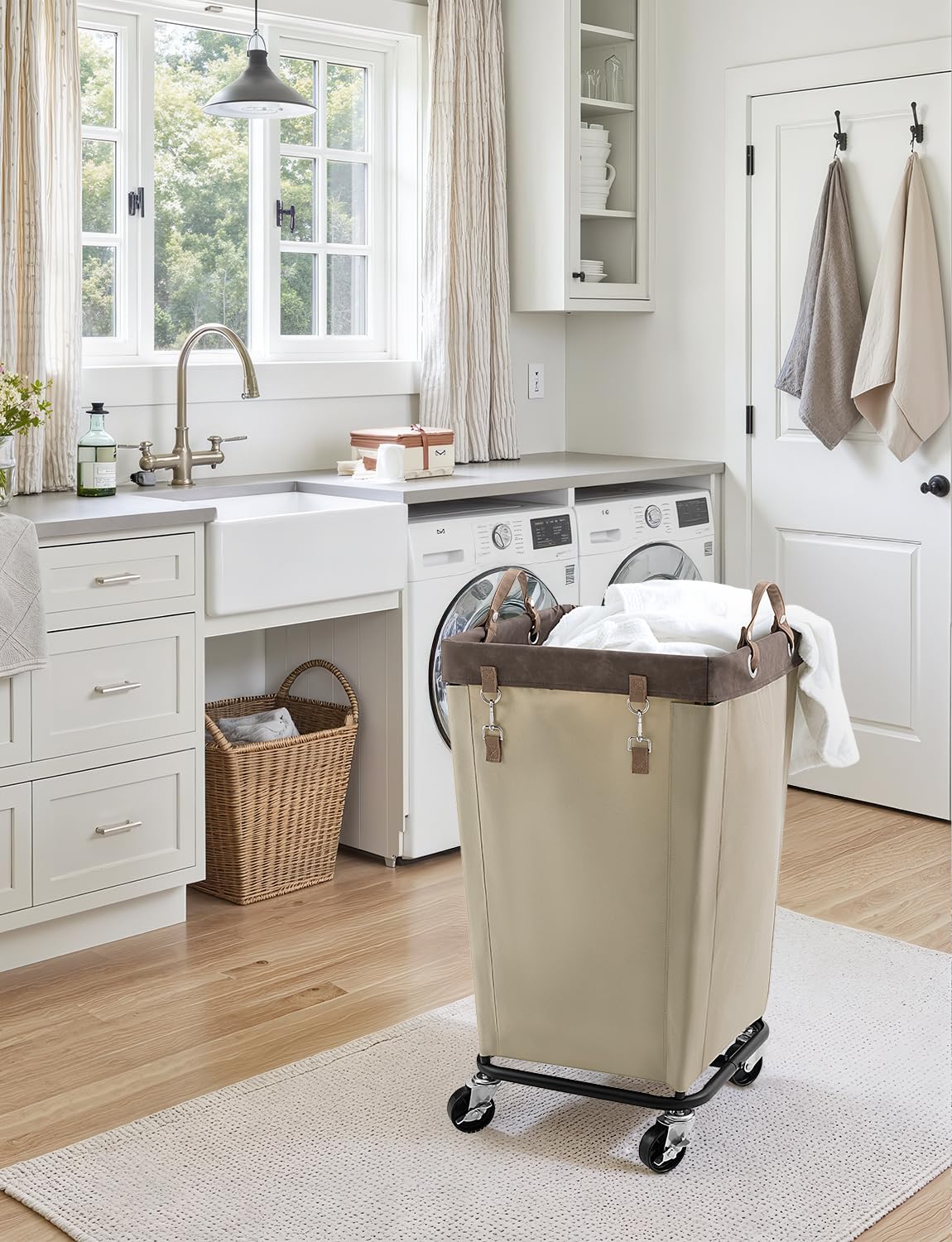 StorageWorks light khaki laundry basket designed for dorms and homes.