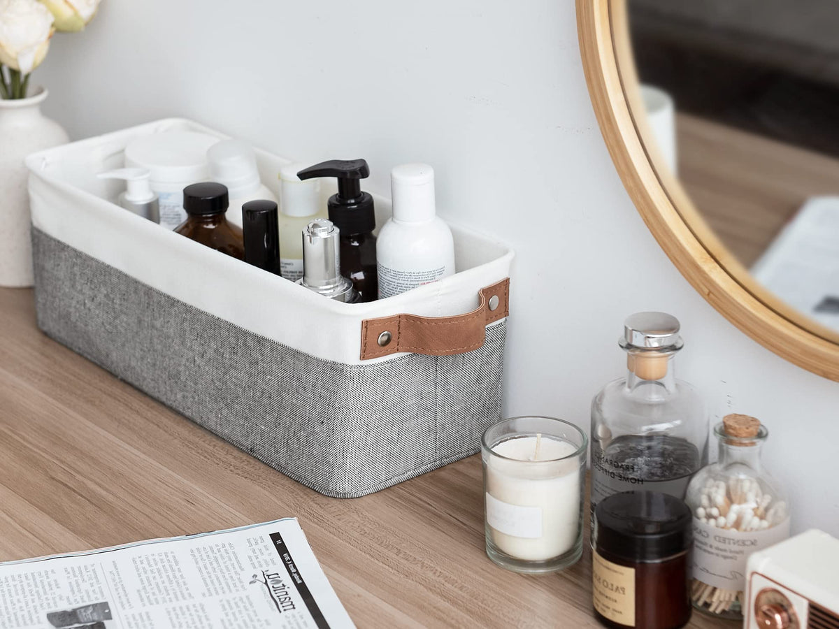 StorageWorks narrow bin with towels, perfect for linen closet organization.
