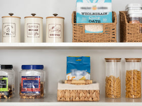 StorageWorks natural finish adds warm texture to bathroom decor.