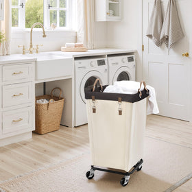 StorageWorks rolling laundry cart during assembly with included tools