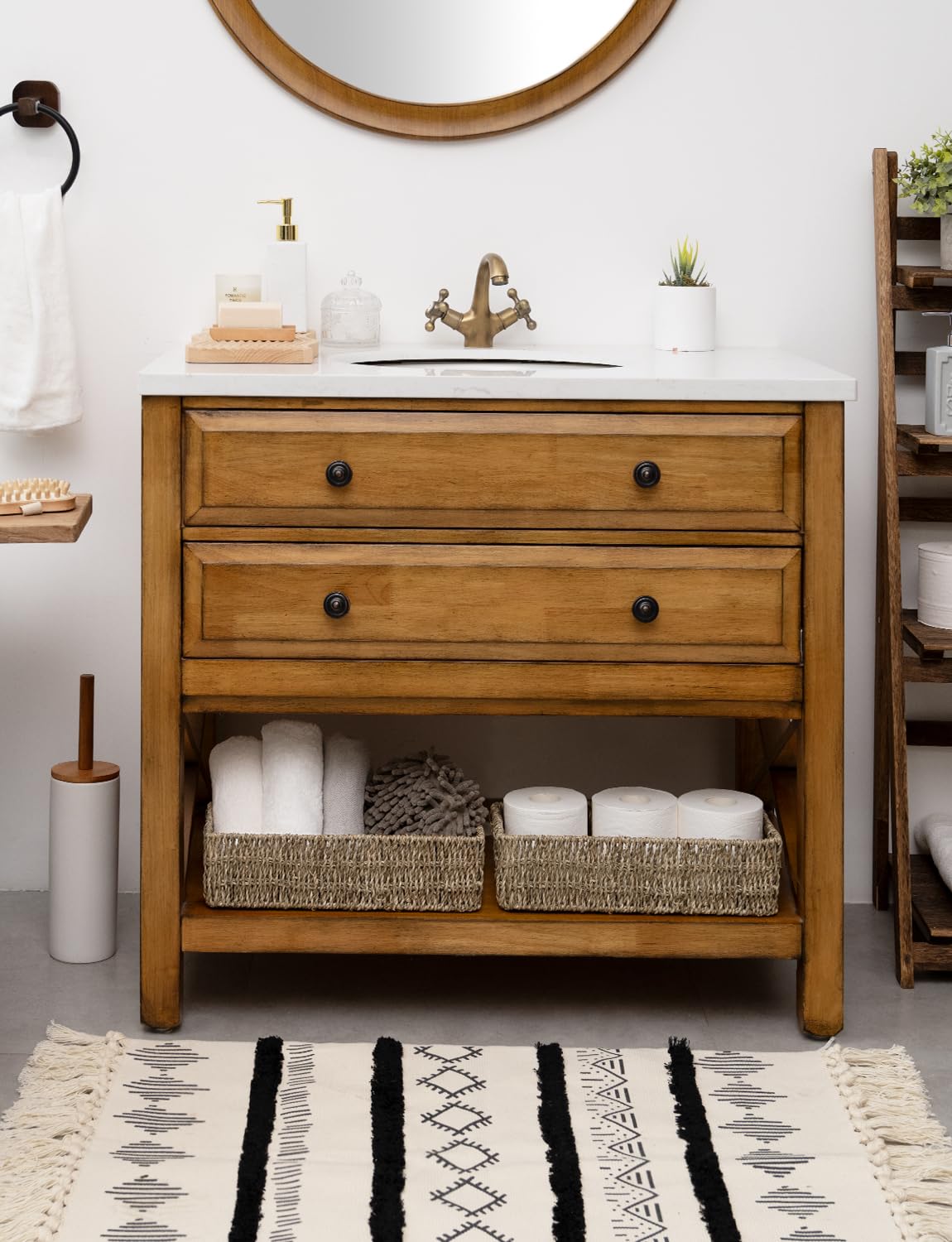 StorageWorks seagrass basket for skincare and towels on vanity