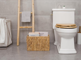 StorageWorks side table organizer basket keeps items tidy and accessible.