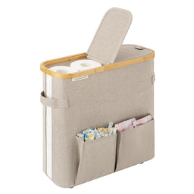 StorageWorks dual flip lids basket view showing concealed toilet paper storage for easy access
